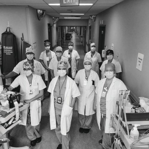 Laboratory Medicine Technicians stand with ECGs machines