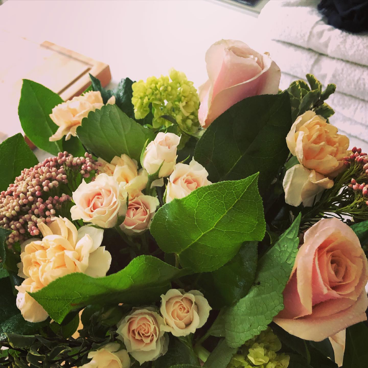 pink and green floral arrangement